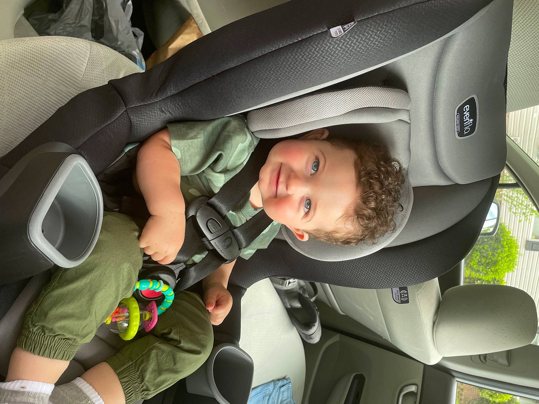 Micah is registered to the contest to win money with this photo: auto_part, automotive_design, automotive_exterior, baby_carriage, baby_in_car_seat, baby_products, car_seat, car_seat_cover, child, comfort, family_car, fun, head_restraint, joy, luxury_vehicle, mode_of_transport, motor_vehicle, person, seat_belt, smile