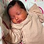 Raelynn is registered to the contest to win money with this photo: baby, blanket, crying, face, happy, head, newborn, person, photography, portrait, sad, sleeping, smile