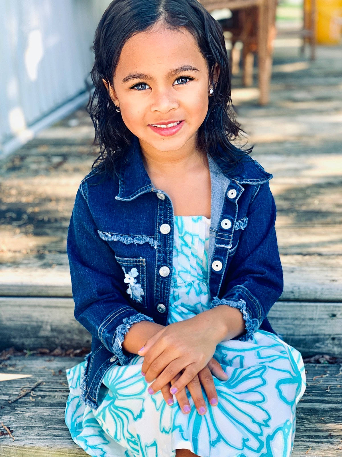 Raina is registered to the contest to win money with this photo: beauty, blue, child, child_model, cool, denim, eye, fashion, jeans, joy, lady, lip, long_hair, outerwear, person, photo_shoot, photography, sitting, skin, smile