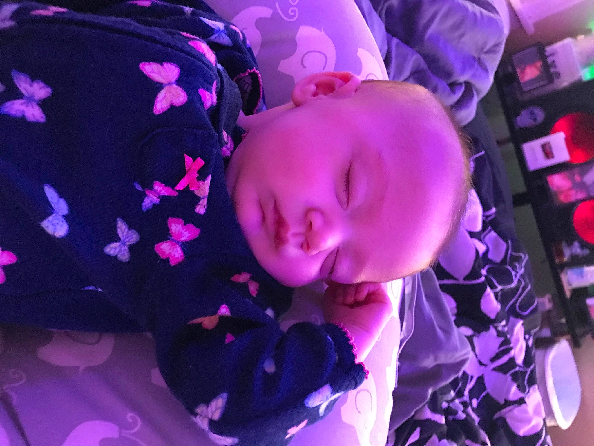 Ellianna is registered to the contest to win money with this photo: audio_equipment, black_hair, child, electric_blue, eyelash, flower, lip, magenta, mouth, pattern, person, petal, pink, plant, purple, room, skin, toy, violet