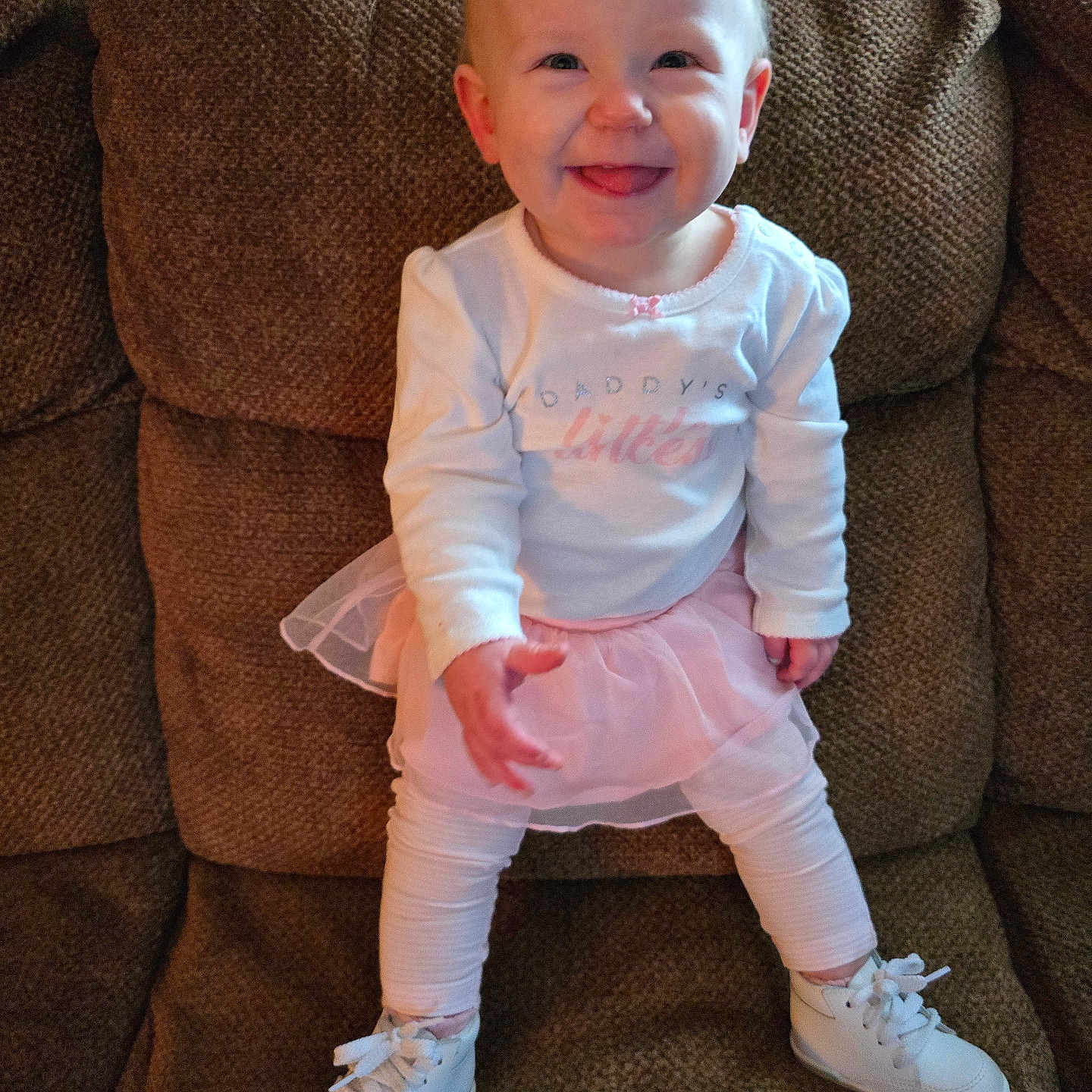 Kayla joined the competition — help win amazing prizes! architecture, baby, chair, clothing, couch, cushion, face, footwear, furniture, happy, head, homedecor, pants, person, photography, portrait, shoe, sitting, sneaker, standing