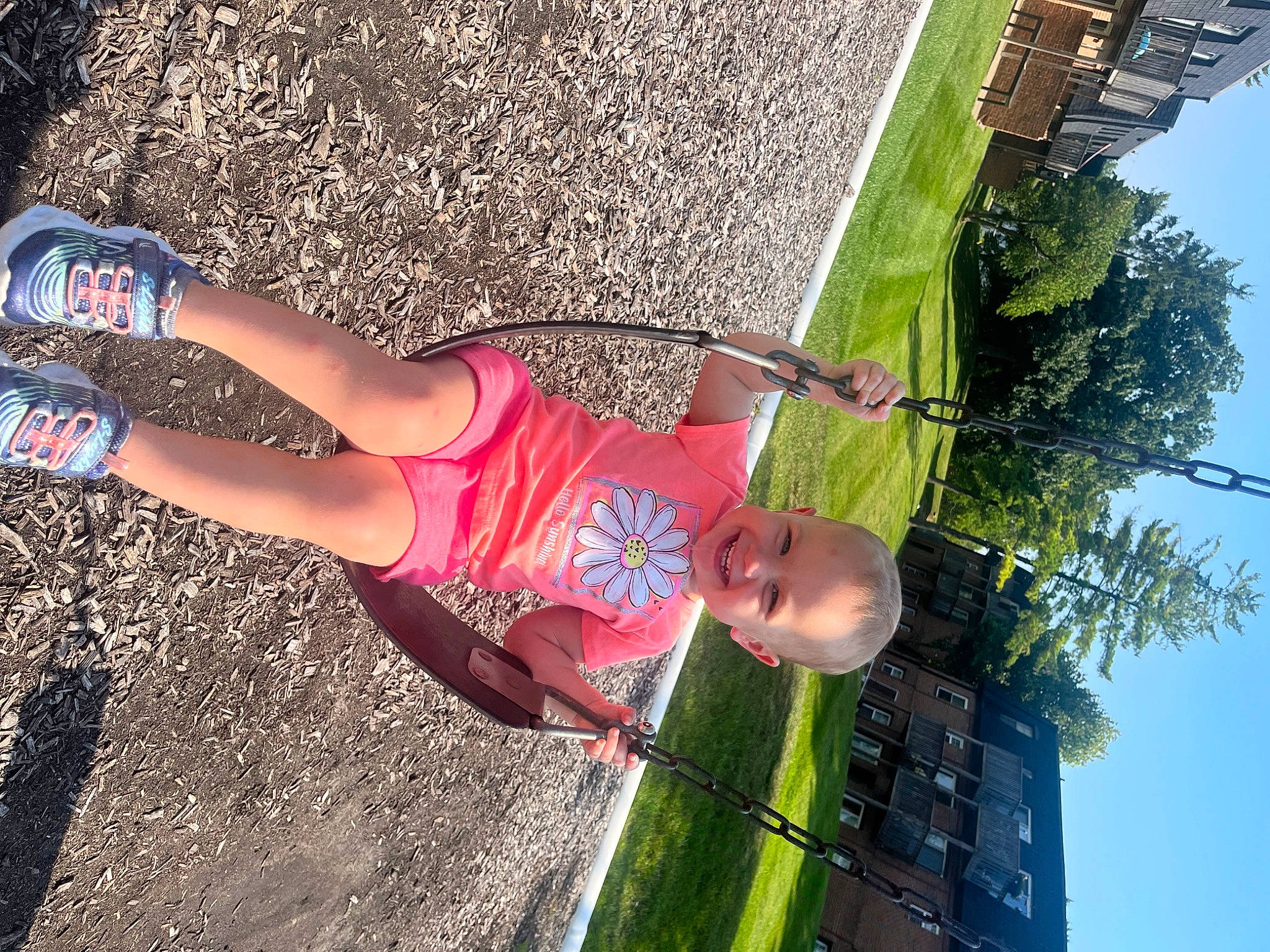 Raylynn is registered to the contest to win money with this photo: elbow, exercise, fun, grass, happy, human_leg, joy, knee, leg, leisure, line, people_in_nature, person, plant, recreation, shorts, sky, snapshot, thigh, tree