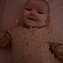 Freya joined the competition — help win amazing prizes! baby, infant, smiling, lying_down, clothing, onesie, pink, polka_dots, bed, mattress, cute, child, sleepwear, peaceful, face, head, person, one_person, indoors, soft_lighting