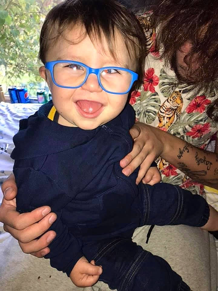 Malachi is registered to the contest to win money with this photo: child, cool, eyewear, finger, gesture, glasses, hand, person, smile, thumb, vision_care