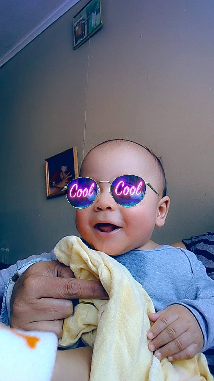 Elian joined the competition — help win amazing prizes! baby, child, cool, eyewear, finger, fun, glasses, head, nose, person, purple, sunglasses, toddler, vacation, vision_care