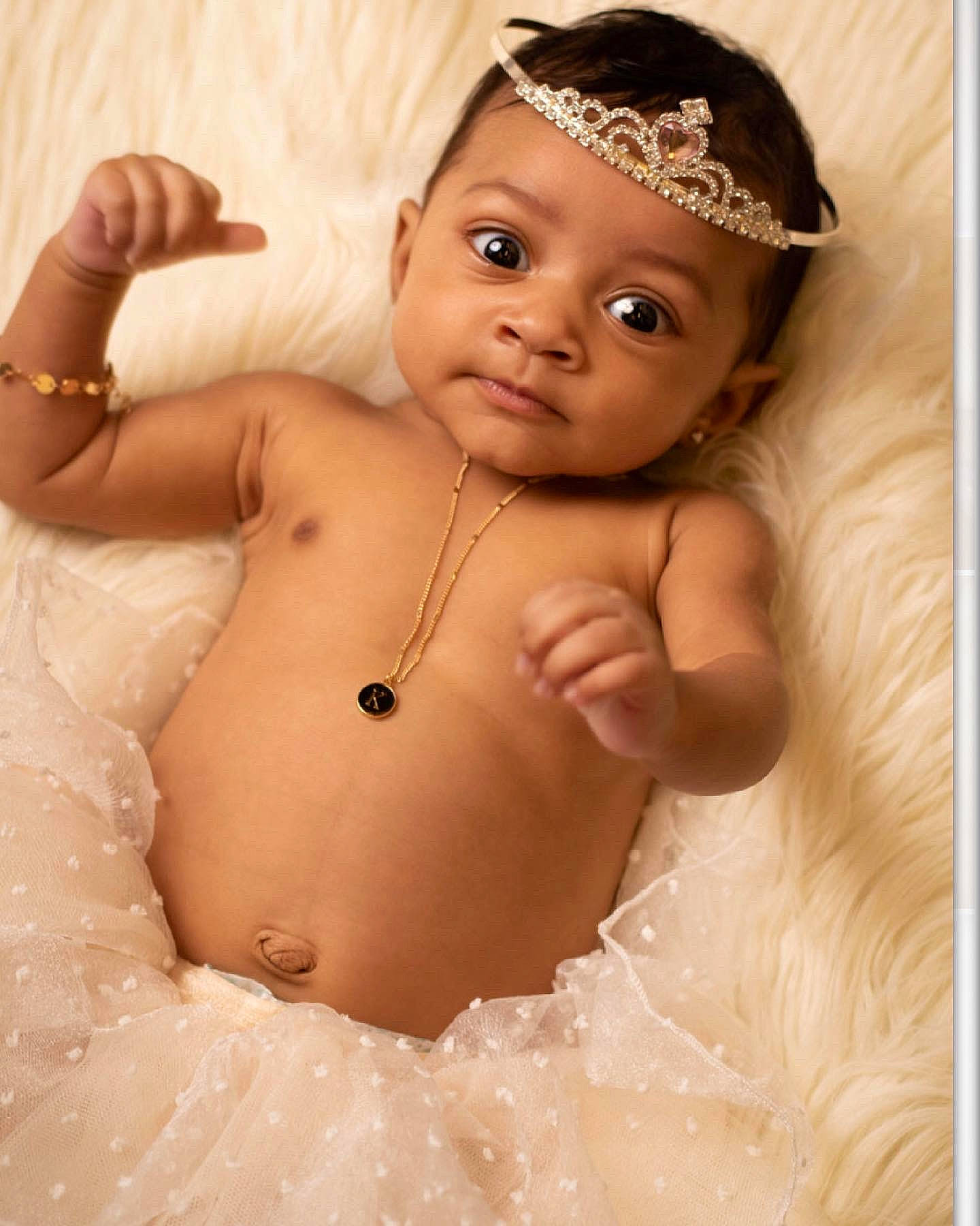 Kayonna joined the competition — help win amazing prizes! baby, baby_toddler_clothing, cap, cheek, chest, eye, eyebrow, eyelash, face, finger, gesture, happy, head, human_body, lip, nose, person, skin, stomach, toddler