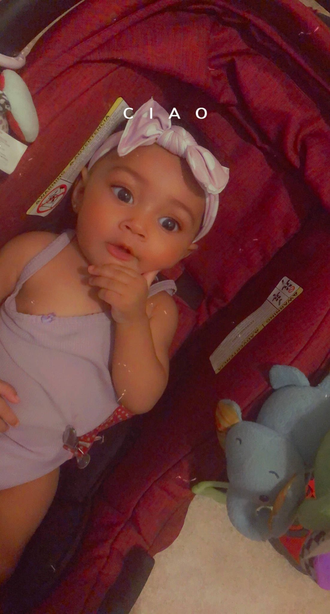 Kayonna is registered to the contest to win money with this photo: baby, baby_toddler_clothing, cheek, child, eye, eyelash, finger, fun, headband, headwear, iris, lip, mouth, nose, person, pink, room, skin, stuffed_toy, textile