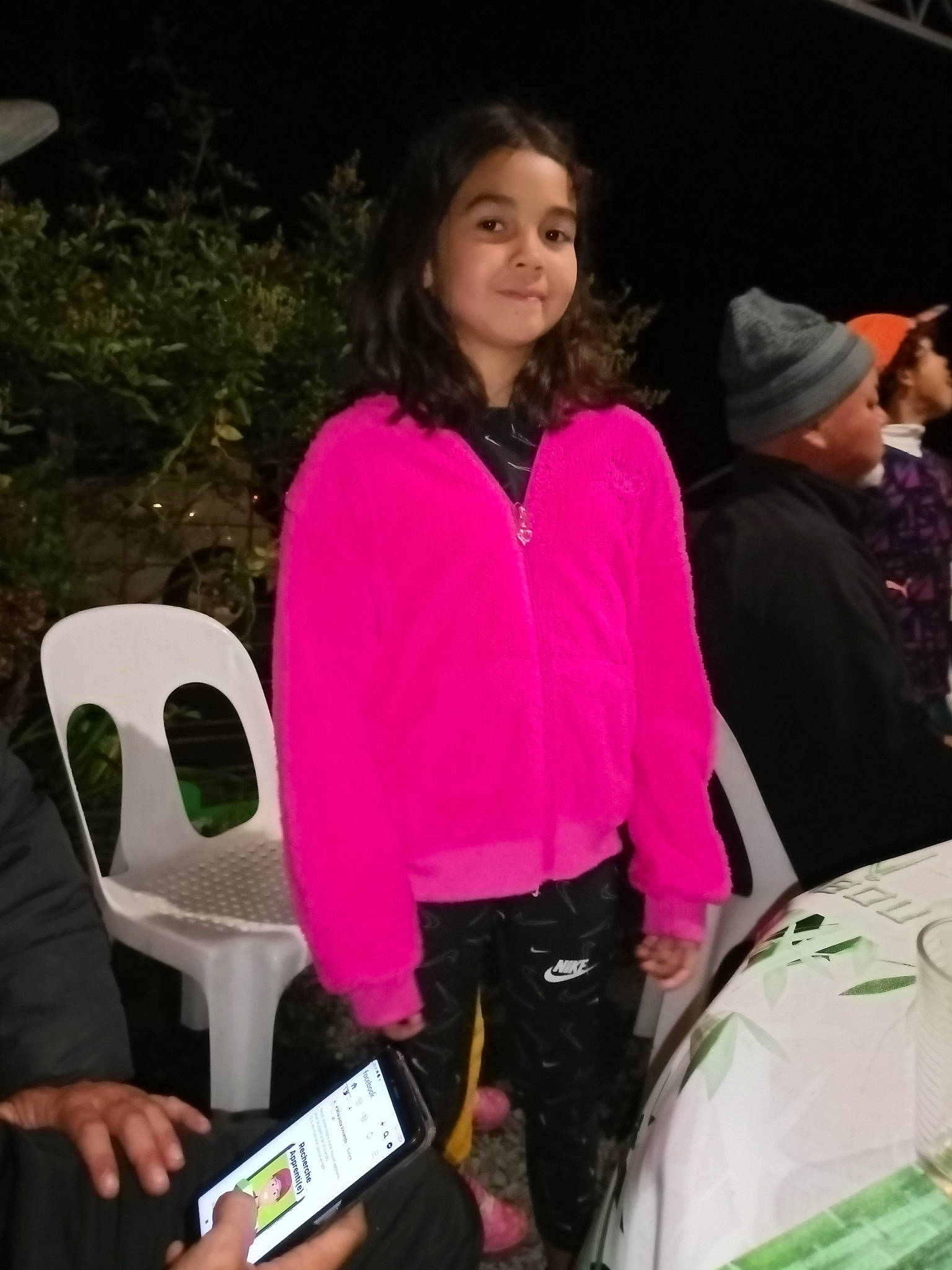 Raelya participe au concours pour gagner de l'argent avec cette photo : bag, black, chair, event, fashion_accessory, fun, fur, hat, jacket, joy, leisure, luggage_and_bags, magenta, person, personal_protective_equipment, pink, plant, product, recreation, sleeve