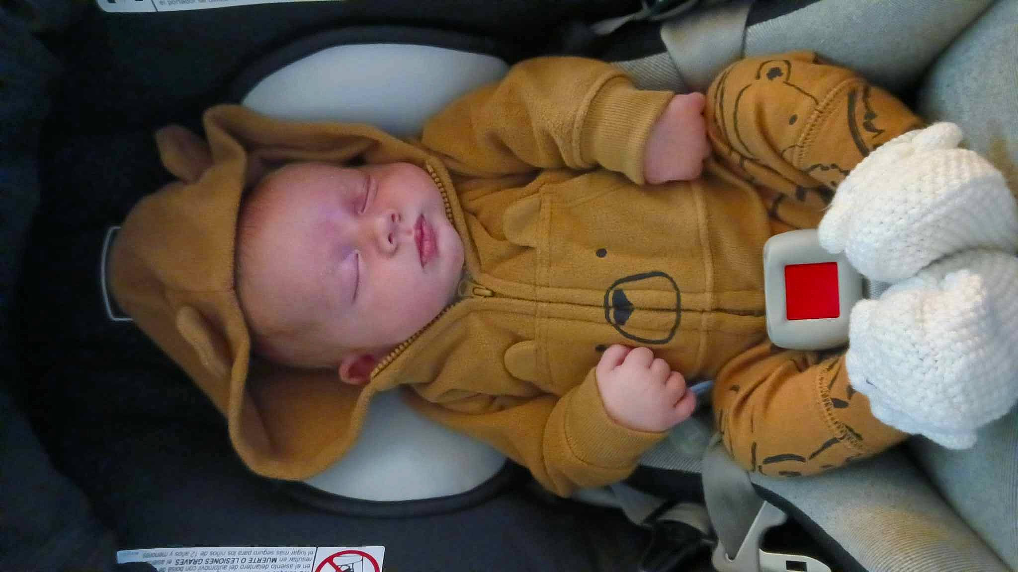 Adam is registered to the contest to win money with this photo: baby, baby_products, baby_safety, baby_sleeping, baby_toddler_clothing, bedtime, car_seat, cheek, child, comfort, head, linens, nap, person, room, sitting, skin, thumb, toddler, toy