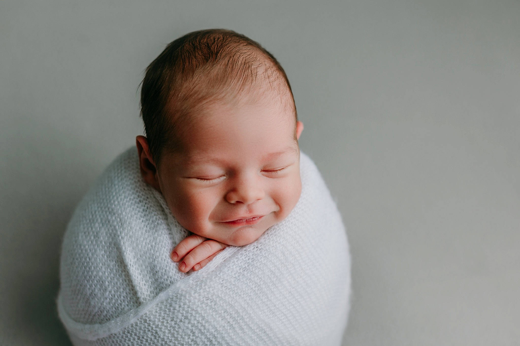 Hayes joined the competition — help win amazing prizes! baby, baby_toddler_clothing, cheek, child, collar, comfort, eyebrow, finger, flash_photography, gesture, happy, linens, neck, nose, person, portrait_photography, sitting, sleeve, smile, toddler