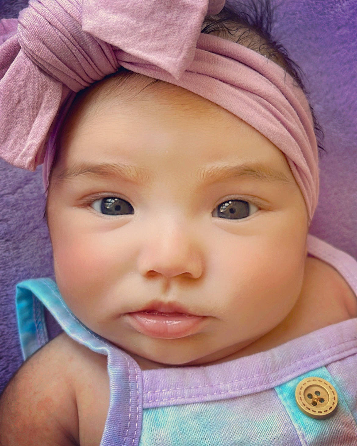 Leia is registered to the contest to win money with this photo: cap, cheek, chin, clothing, eye, eyebrow, eyelash, face, facial_expression, forehead, headwear, iris, lip, mouth, neck, nose, organ, person, pink, purple