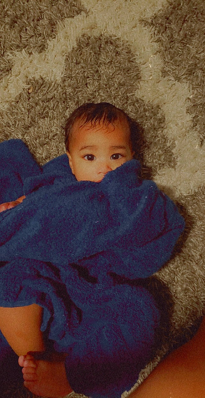 Ocean joined the competition — help win amazing prizes! art, cheek, comfort, electric_blue, eye, eyebrow, hairstyle, iris, linens, lip, mammal, nose, pattern, person, skin, sleeve, t_shirt, textile, toddler, wood