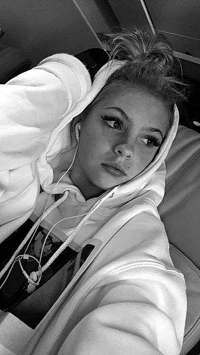 Typhaine a rejoint le concours — aidez-le/la à gagner de superbes lots ! black_and_white, child, comfort, elbow, eyelash, flash_photography, fun, gesture, happy, linens, lip, monochrome, monochrome_photography, outerwear, person, photo_shoot, portrait, portrait_photography, sitting, street