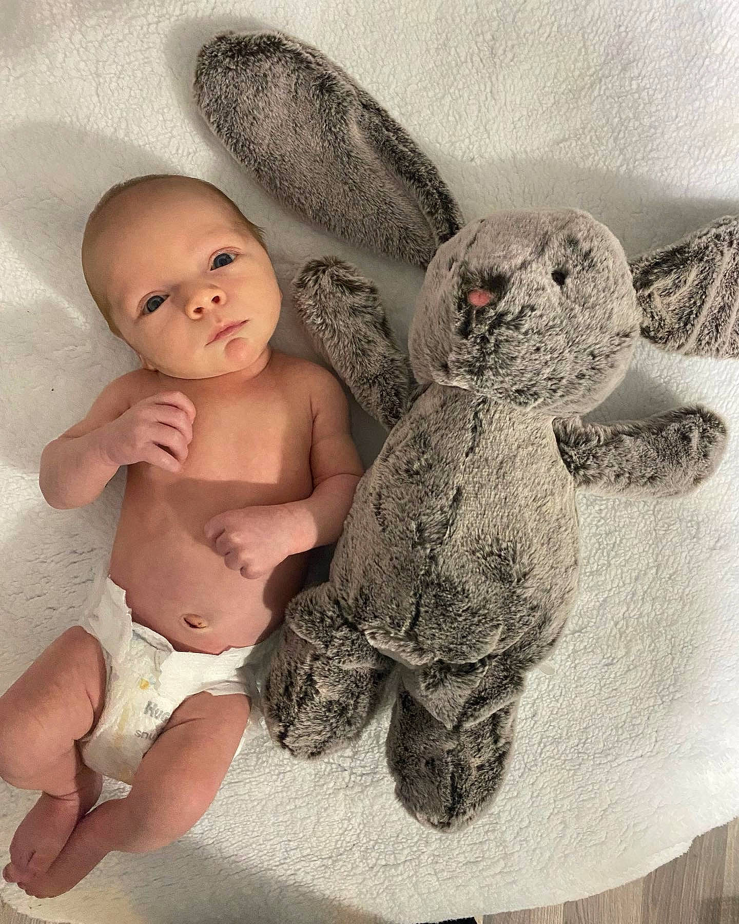 Damian is registered to the contest to win money with this photo: abdomen, art, baby, baby_sleeping, baby_toddler_clothing, chest, comfort, fashion_accessory, foot, gesture, happy, person, product, room, stomach, stuffed_toy, textile, thigh, toddler, toy