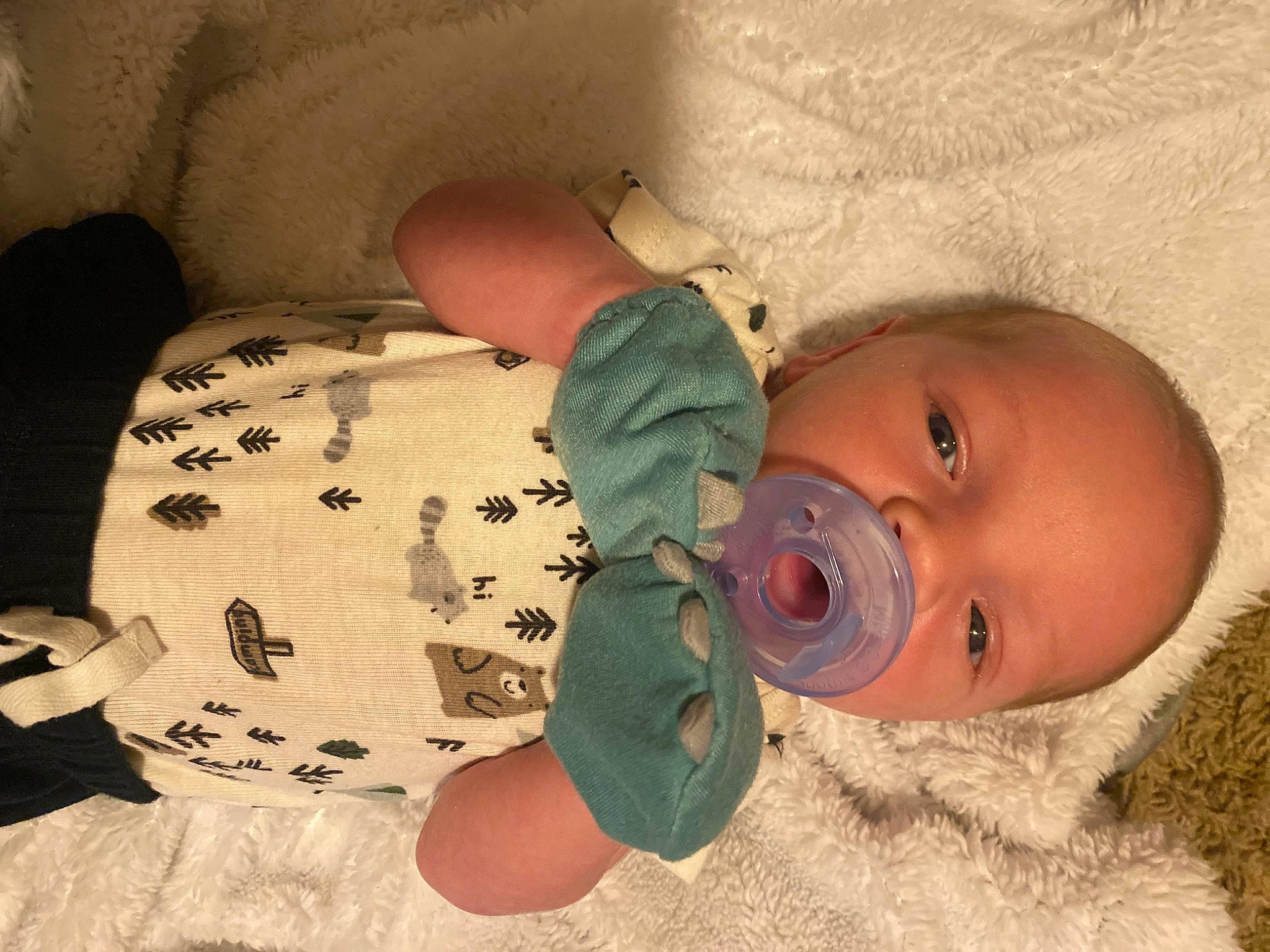 Damian is registered to the contest to win money with this photo: baby, baby_products, baby_safety, baby_sleeping, baby_toddler_clothing, cheek, child, comfort, ear, finger, head, helmet, human_body, linens, nose, person, product, room, skin, sleeve