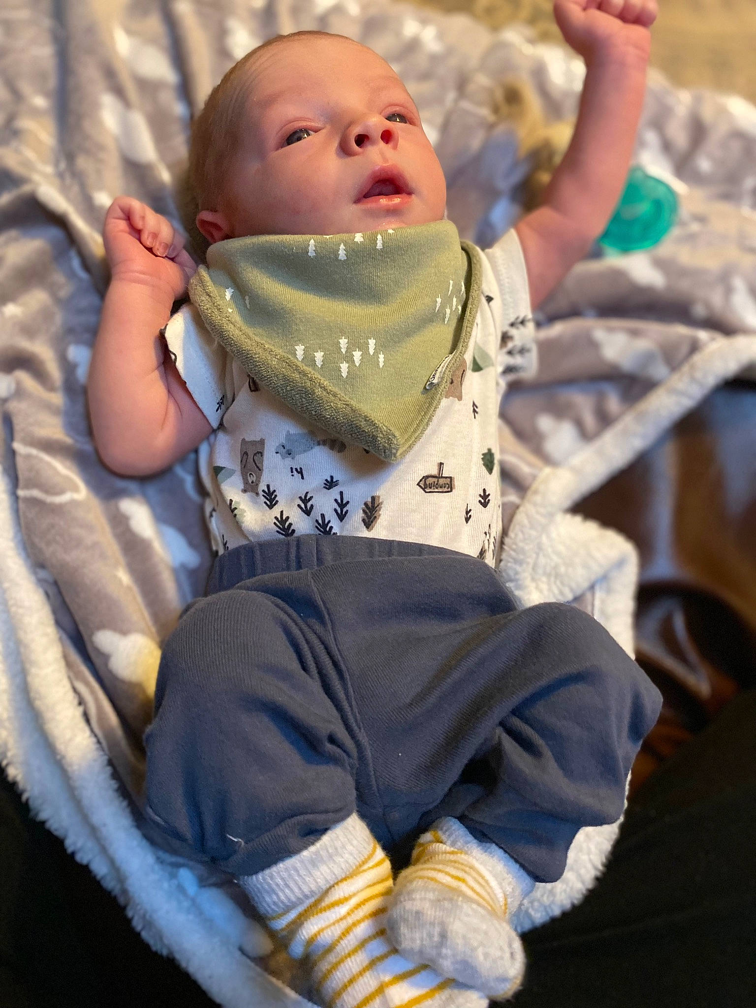 Damian is registered to the contest to win money with this photo: arm, baby, baby_toddler_clothing, bib, child, eye, finger, fun, grass, green, happy, leisure, people_in_nature, person, photograph, skin, sleeve, textile, toddler, white