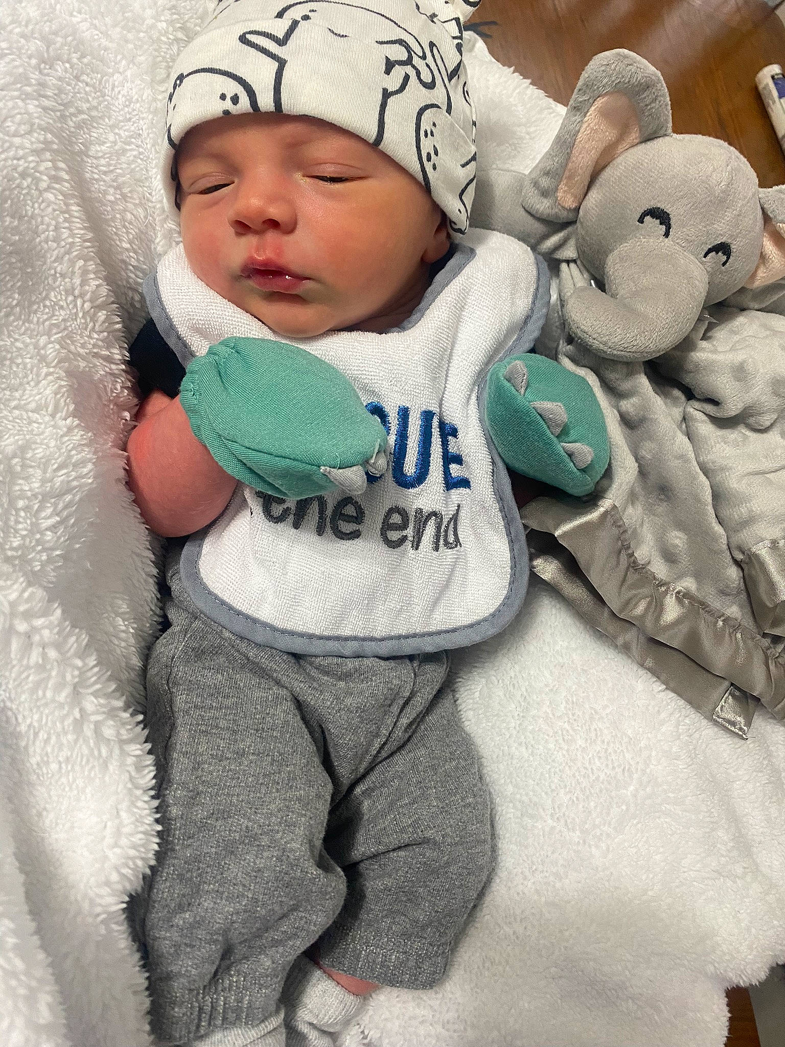 Damian is registered to the contest to win money with this photo: baby, baby_toddler_clothing, cap, cheek, child, cool, face, gesture, happy, hat, head, headwear, outerwear, people, person, photograph, sleeve, snapshot, t_shirt, toddler