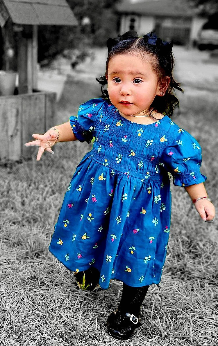Alondra joined the competition — help win amazing prizes! arm, azure, baby_toddler_clothing, day_dress, dress, electric_blue, eye, grass, hair, hairstyle, happy, head, one_piece_garment, pattern, people_in_nature, person, plant, purple, sleeve, standing