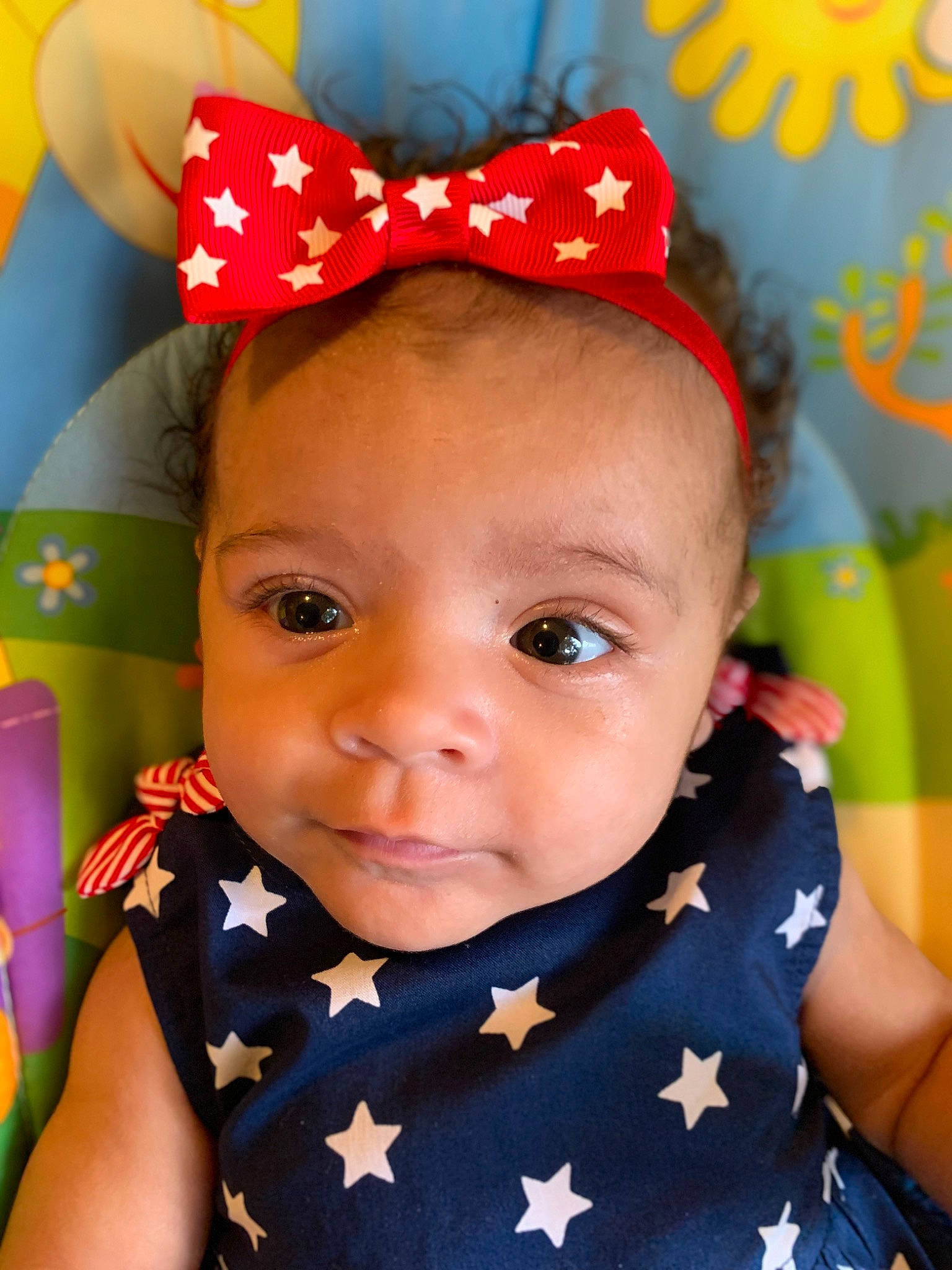 Amara is registered to the contest to win money with this photo: baby, baby_toddler_clothing, cap, cheek, child, chin, costume_hat, electric_blue, eyelash, facial_expression, fashion_accessory, fun, happy, headgear, lip, magenta, person, pink, red, skin