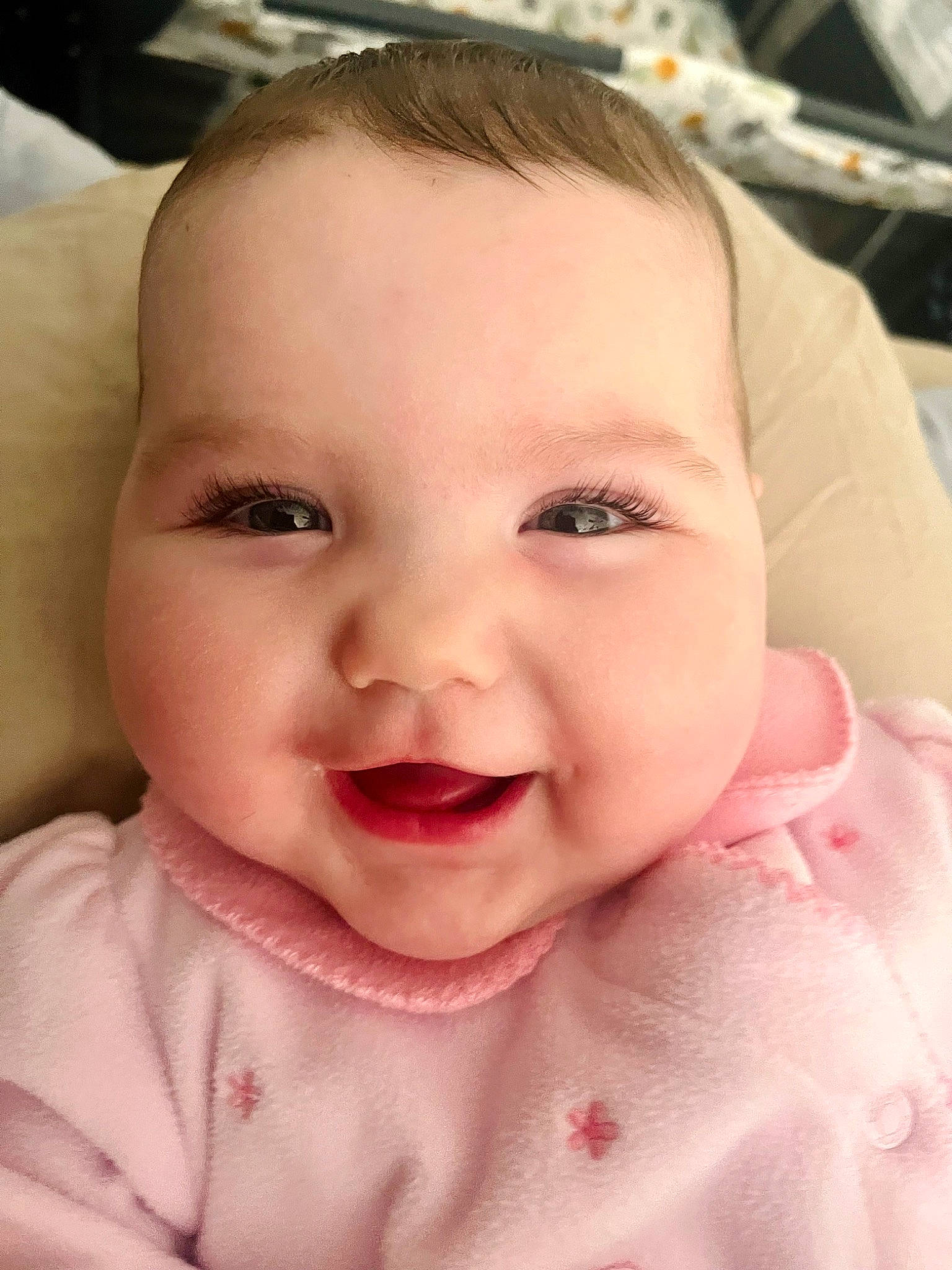Aubrey is registered to the contest to win money with this photo: baby, baby_toddler_clothing, cheek, chin, ear, eye, eyebrow, eyelash, facial_expression, happy, head, iris, joy, lip, mouth, nose, person, pink, skin, smile