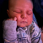 Dexter joined the competition — help win amazing prizes! baby, sleeping, infant, onesie, grey_clothing, hand, face, peaceful, child, closeup, soft_lighting, cute, small_fist, newborn, portrait, indoors, cozy, relaxed, childhood, apparel