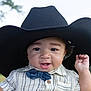 accessories, baby, bonnet, cap, clothing, cowboyhat, face, formalwear, hat, head, person, photography, portrait, sombrero, sunhat, tie