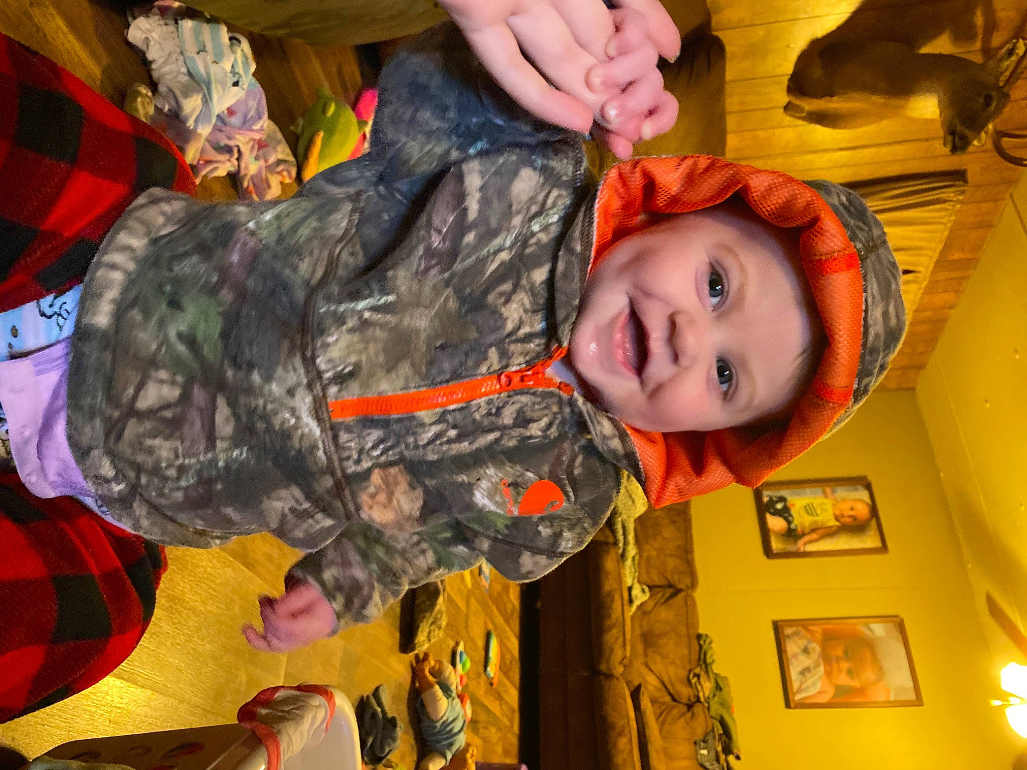 Ryleigh is registered to the contest to win money with this photo: army, camouflage, child, clothing, fun, gesture, happy, headwear, infantry, jacket, marines, military_camouflage, military_organization, military_person, military_uniform, non_commissioned_officer, pattern, person, smile, soldier
