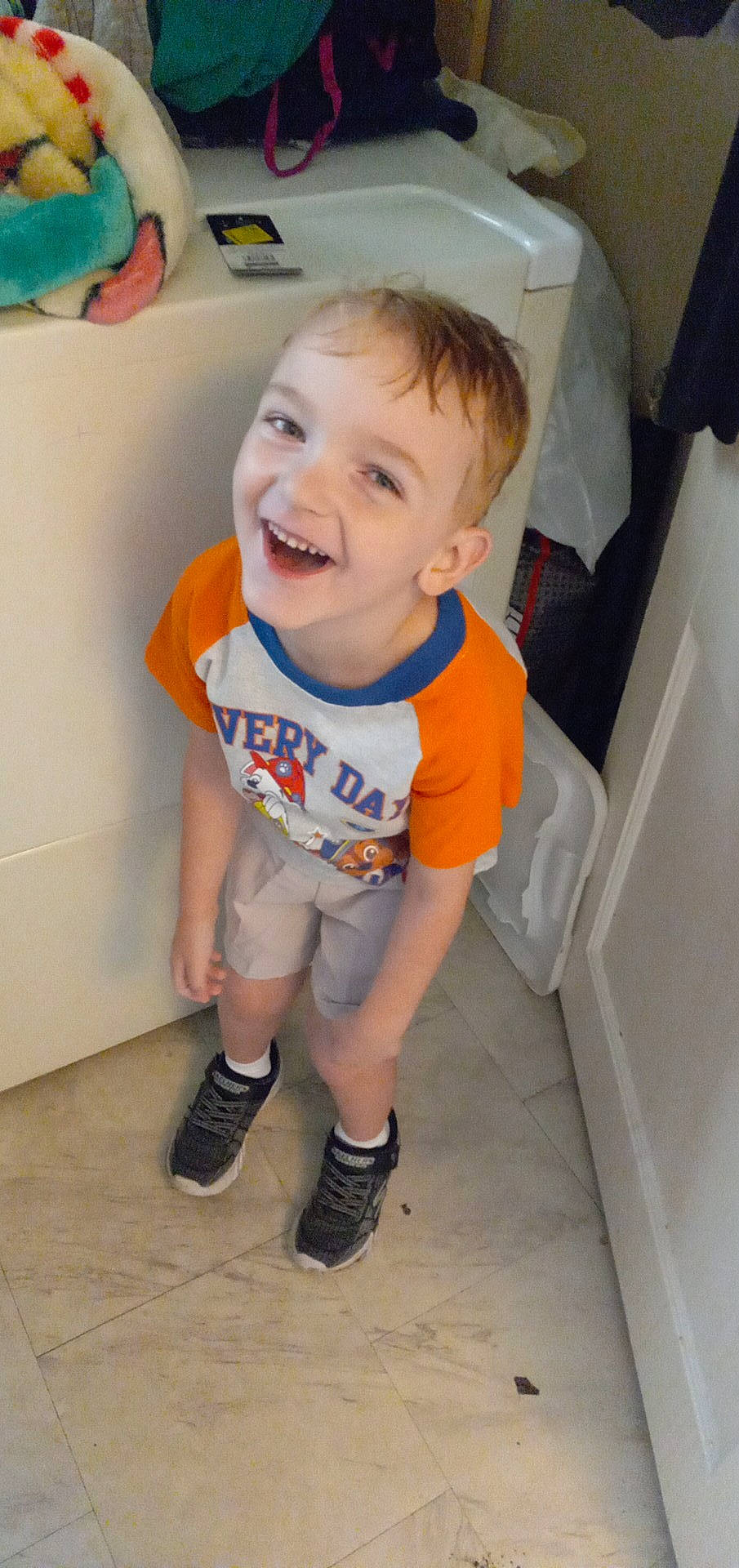 Malaki joined the competition — help win amazing prizes! baby, baby_toddler_clothing, cheek, child, electric_blue, eye, facial_expression, flooring, fun, hairstyle, happy, humour, joy, mouth, person, room, skin, sleeve, smile, standing