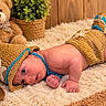 Kaylen is registered to the contest to win money with this photo: newborn, baby, child, infant, crawling, portrait, crocheted_outfit, cowboy_hat, cowboy_boots, teddy_bear, stuffed_animal, nursery, cozy, blanket, furry_rug, wooden_background, plant, indoor, adorable, photography