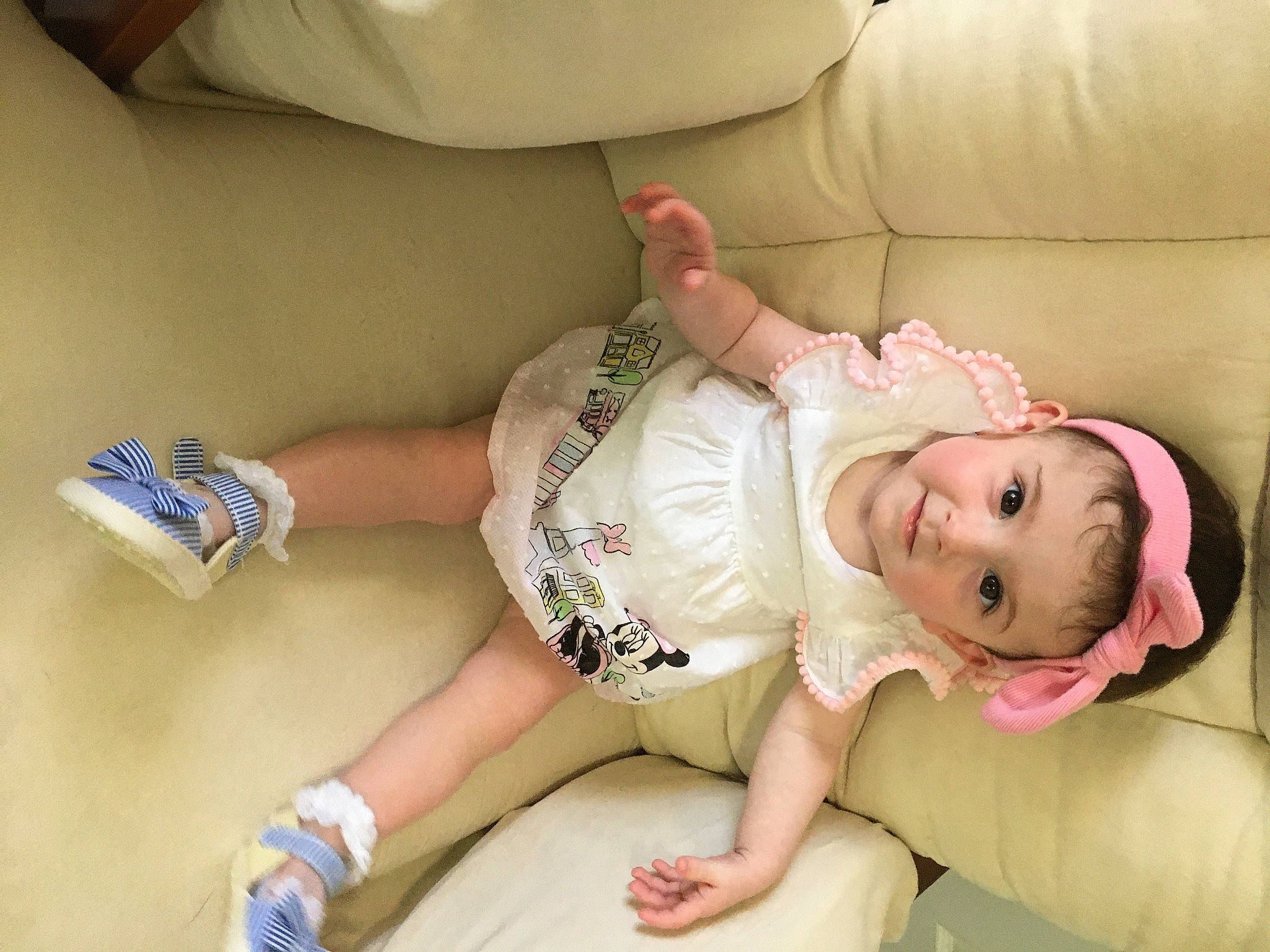 Lita is registered to the contest to win money with this photo: arm, baby, baby_toddler_clothing, comfort, couch, elbow, eye, eyelash, flooring, glasses, human_leg, joint, knee, leg, mouth, nail, person, skin, sleeve, thigh