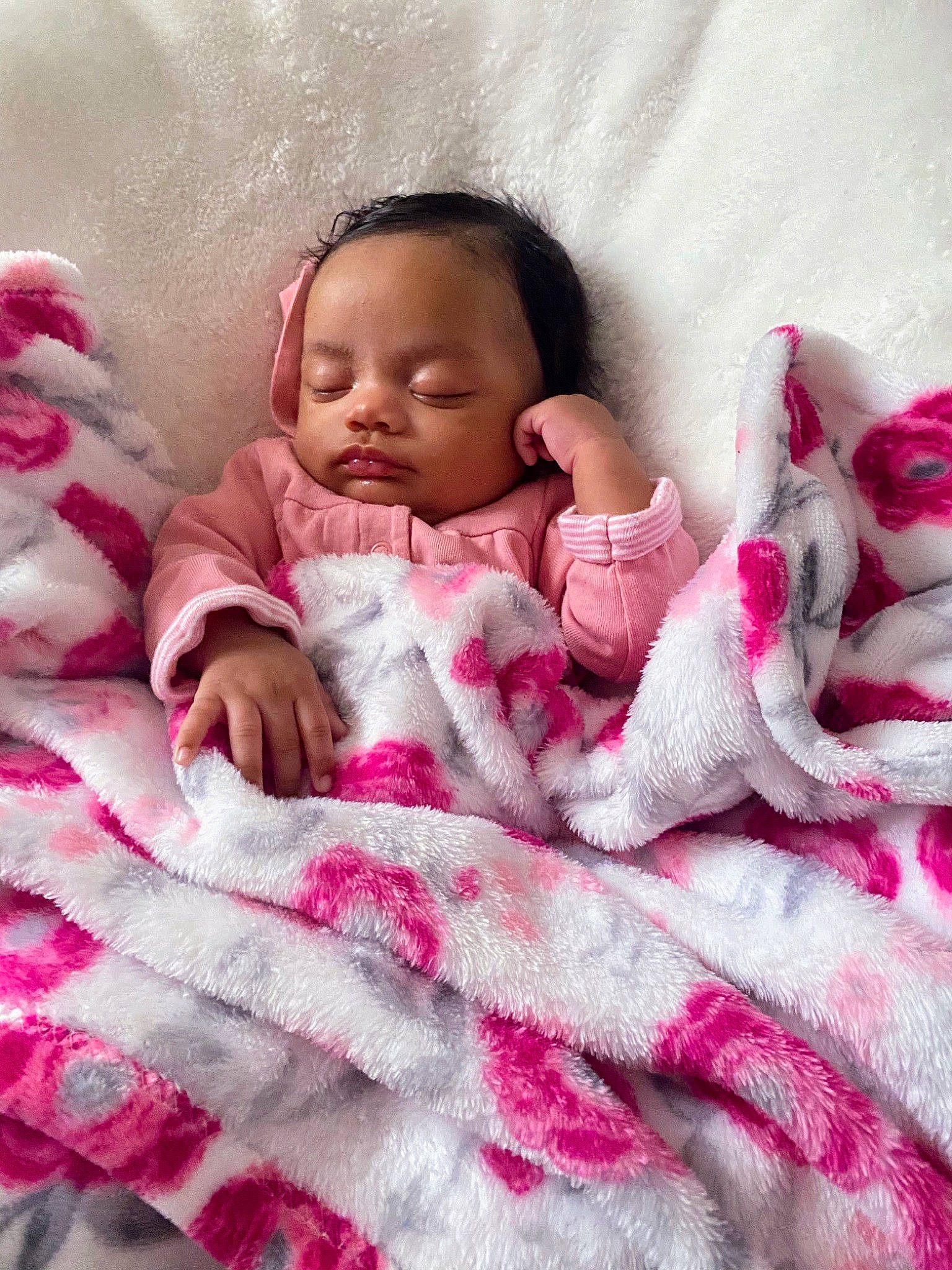 Marianna is registered to the contest to win money with this photo: baby, baby_sleeping, baby_toddler_clothing, bed, bedding, bedtime, comfort, design, finger, hand, happy, linens, lip, magenta, pattern, person, pink, purple, skin, sleeve
