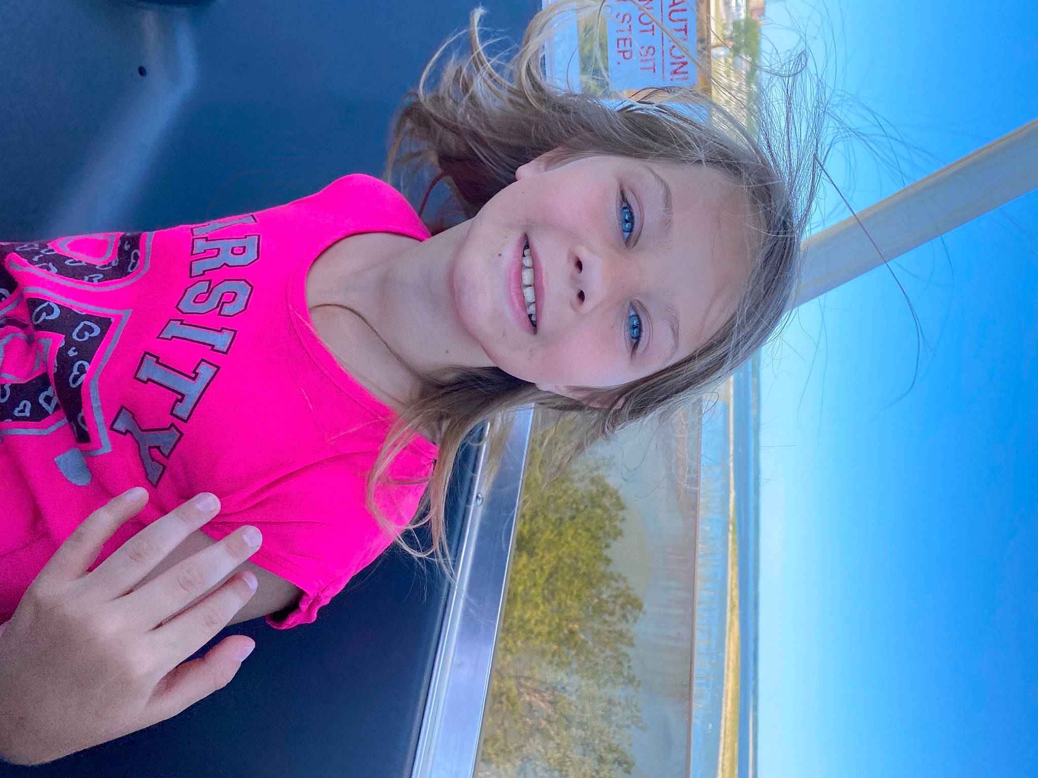 Bella joined the competition — help win amazing prizes! blond, child, electric_blue, facial_expression, flash_photography, fun, happy, jewellery, joy, leisure, magenta, person, portrait_photography, shoulder, sky, smile, sportswear, street_fashion, t_shirt, tree