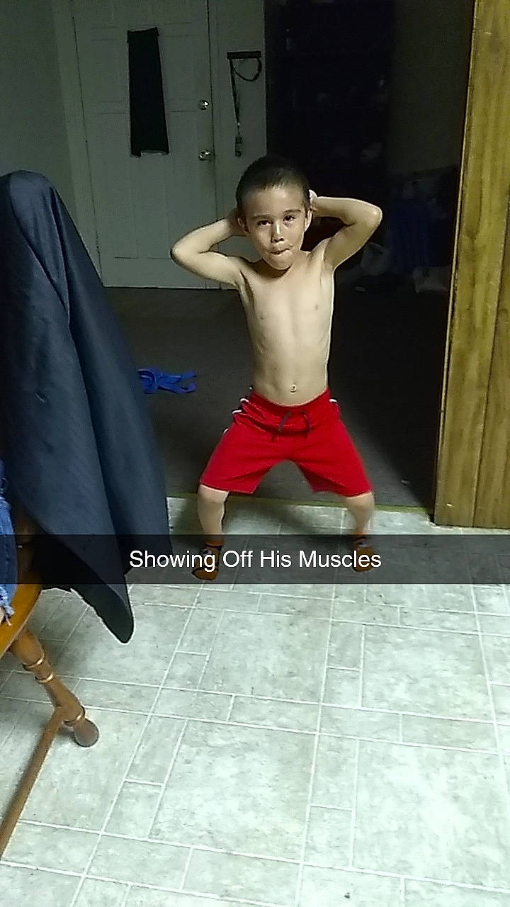 Eric is registered to the contest to win money with this photo: arm, barechested, child, floor, flooring, leg, male, muscle, person, room, toddler