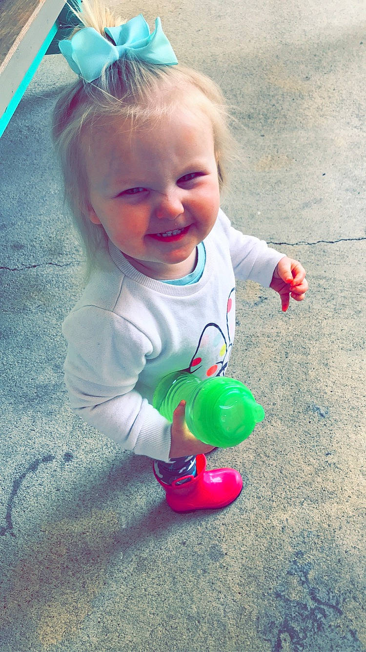 Preslee is registered to the contest to win money with this photo: baby_playing_with_toys, baby_toddler_clothing, beauty, blue, child, facial_expression, fun, grass, happy, joy, organ, people_in_nature, person, photograph, pink, product, skin, smile, standing, summer