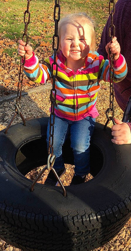 Preslee is registered to the contest to win money with this photo: automotive_tire, beauty, child, finger, fun, hand, happy, human_body, jeans, leisure, organ, person, photograph, play, public_space, smile, snapshot, soil, t_shirt, thumb