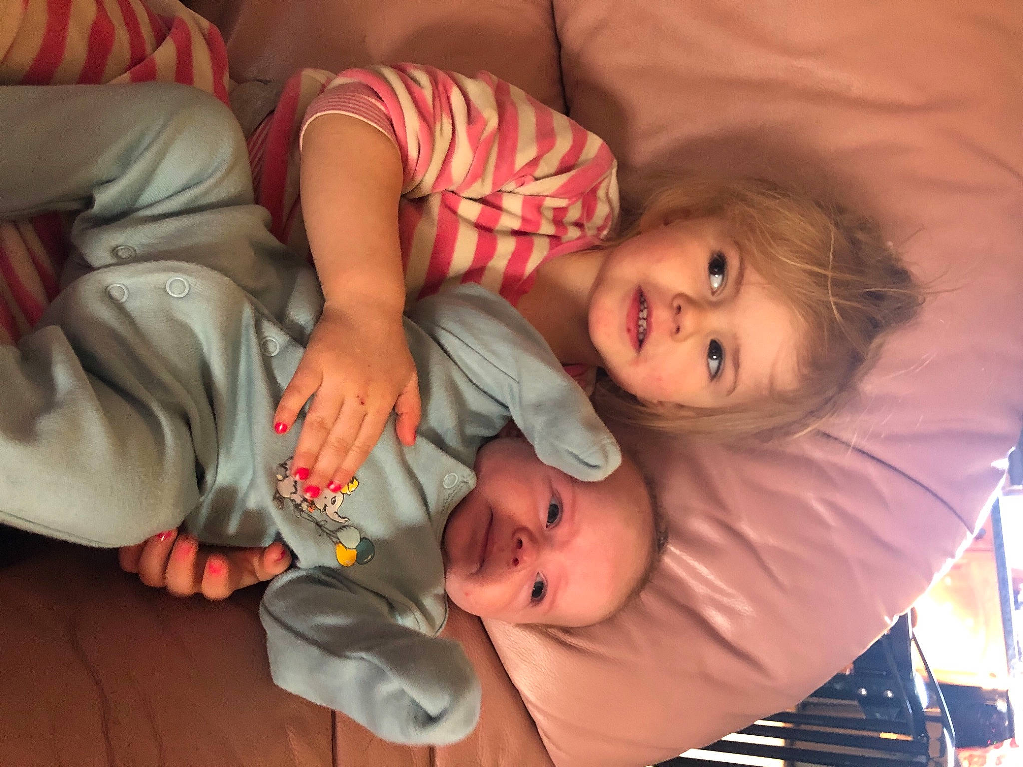 Ava is registered to the contest to win money with this photo: baby, baby_products, baby_toddler_clothing, cheek, child, comfort, finger, fun, hand, iris, lip, mouth, nose, person, room, sitting, skin, smile, toddler, tree