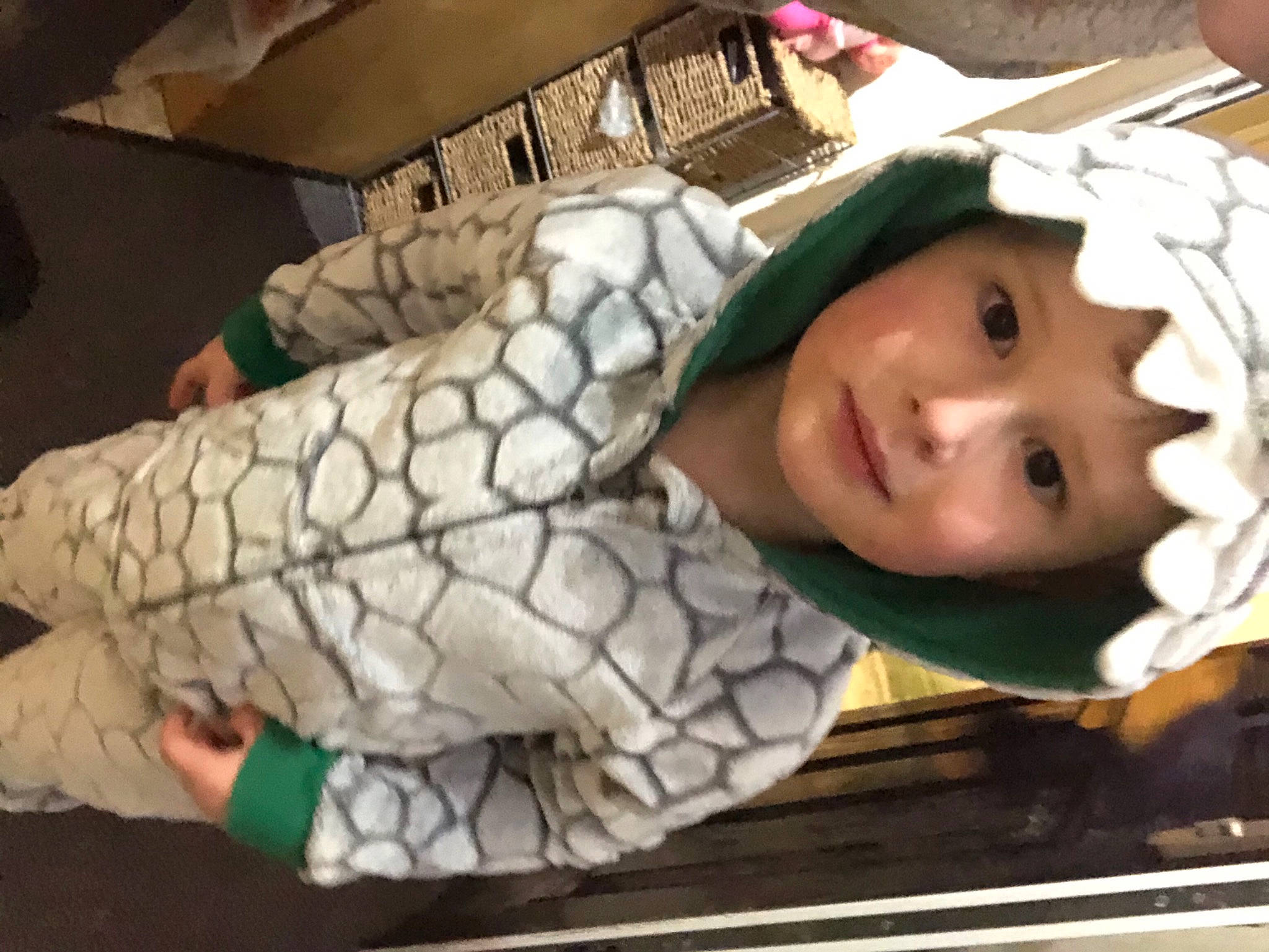 Charlie is registered to the contest to win money with this photo: baby, cheek, child, elbow, eyelash, flooring, fun, happy, headwear, human_leg, mouth, pattern, person, room, smile, toddler, wood