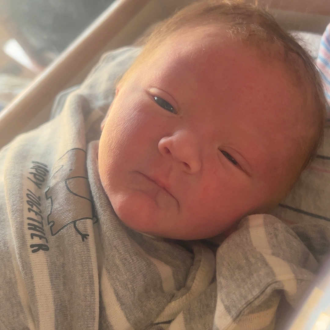 Cashton is registered to the contest to win money with this photo: baby, bed, blanket, cradle, crib, face, furniture, head, homedecor, infantbed, linen, newborn, person, photography, portrait, towel