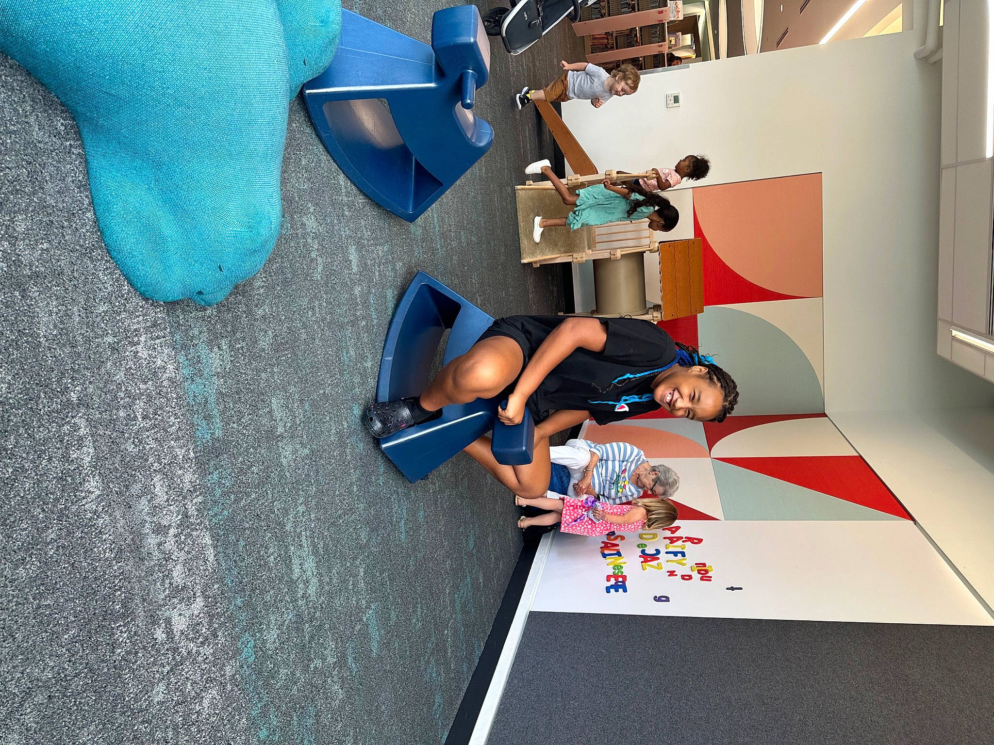 Anissa joined the competition — help win amazing prizes! animation, art, automotive_design, blue, child, electric_blue, flooring, graphic_design, human_leg, illustration, joy, knee, leisure, machine, person, plastic, play, room, t_shirt, thigh