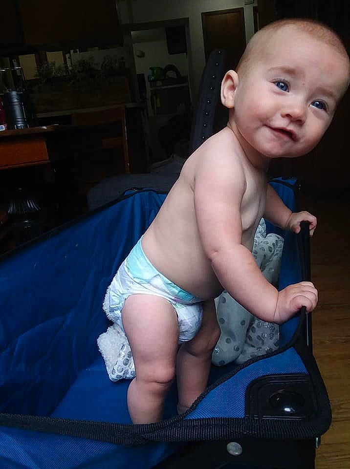 Clover is registered to the contest to win money with this photo: baby, baby_products, cheek, chest, child, diaper, eye, leg, muscle, person, product, sitting, skin, smile, toddler
