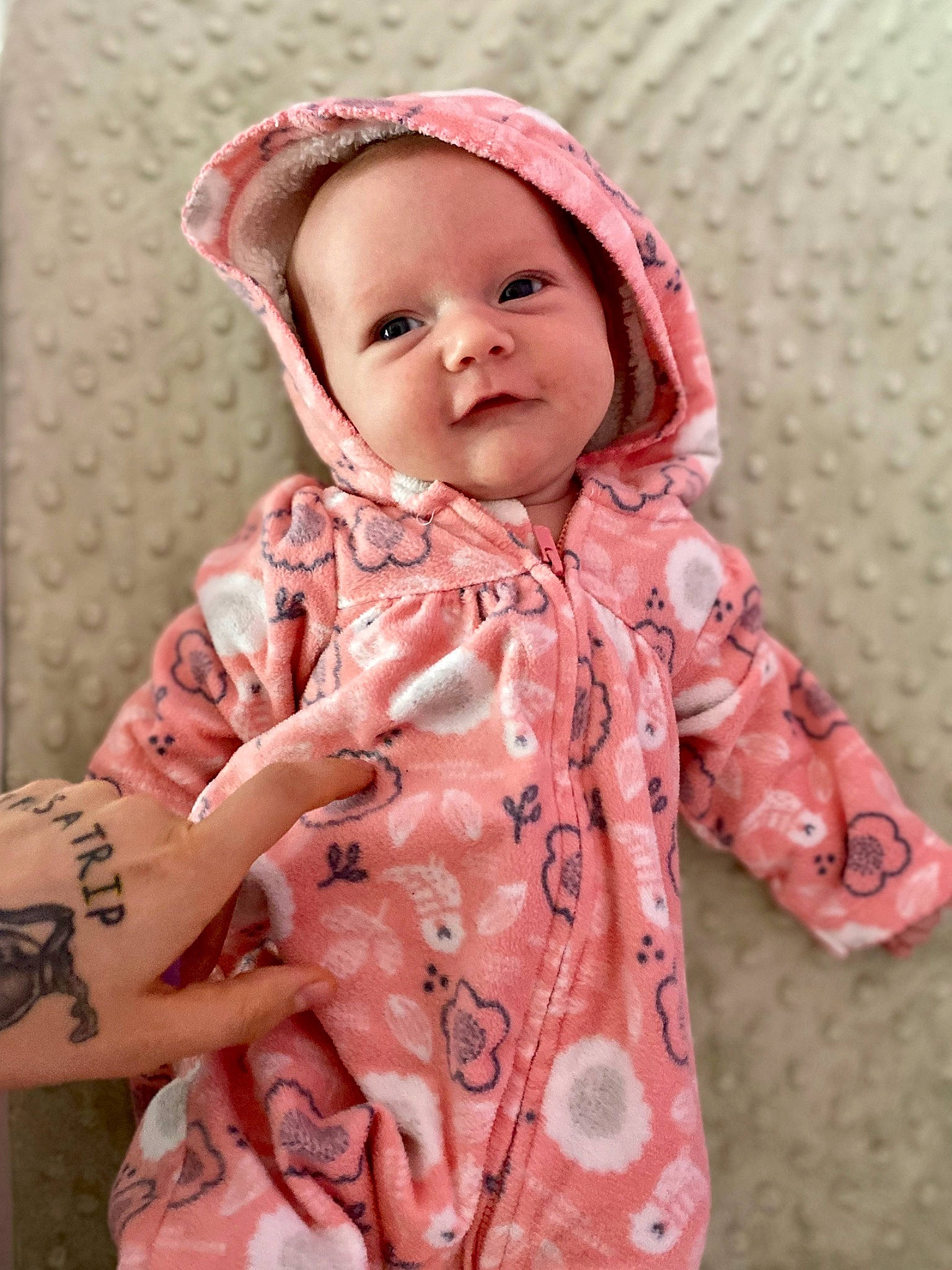 Marleigh is registered to the contest to win money with this photo: baby, baby_toddler_clothing, child, clothing, headgear, outerwear, pattern, peach, person, pink, skin, sleeve, toddler