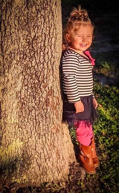 Everleigh joined the competition — help win amazing prizes! adaptation, child, child_model, fun, happy, joy, person, photography, pink, plant, play, portrait, portrait_photography, smile, standing, toddler, tree, trunk, vacation, wood