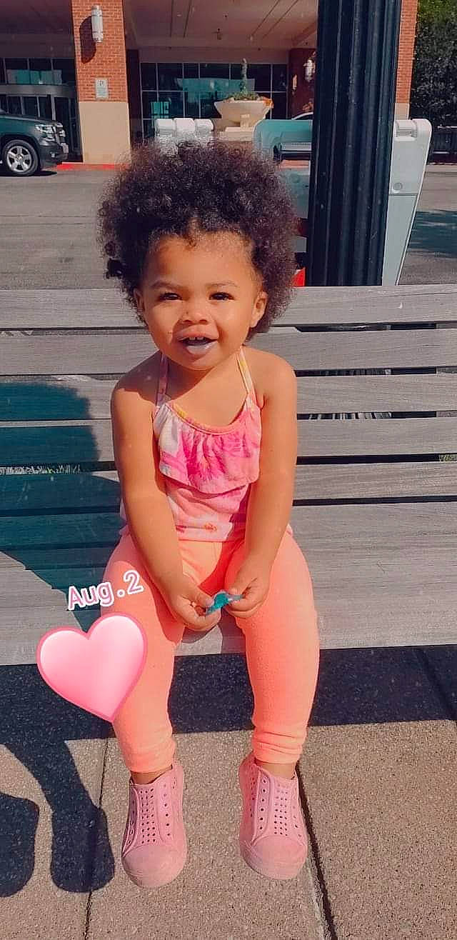 Janessa is registered to the contest to win money with this photo: baby_toddler_clothing, face, finger, fun, hand, happy, head, leg, leisure, magenta, neck, person, pink, shoulder, skin, sleeve, smile, thigh, toddler, waist