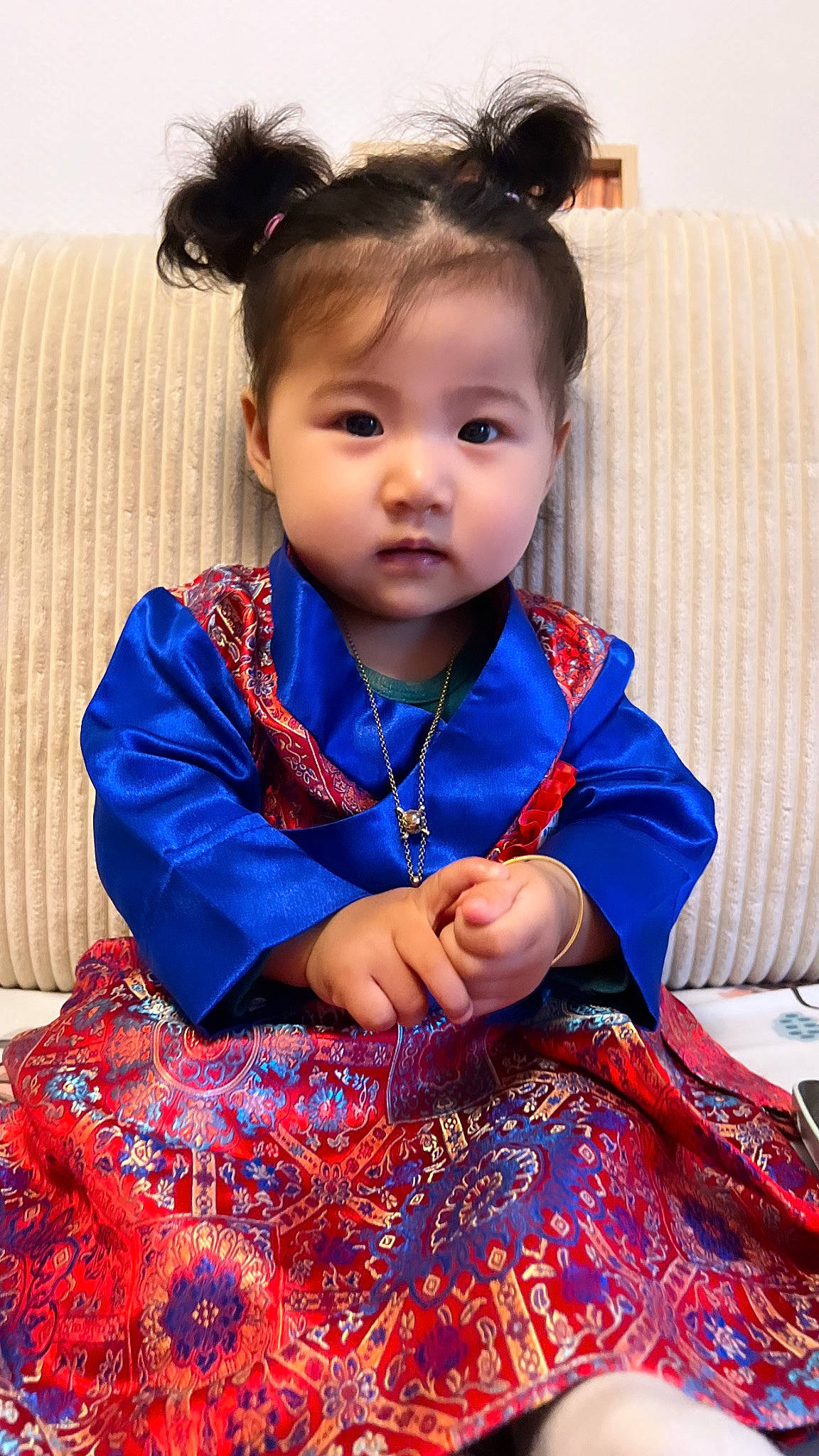 Rose participe au concours pour gagner de l'argent avec cette photo : baby_toddler_clothing, child, day_dress, dress, electric_blue, fashion_accessory, fashion_design, formal_wear, happy, head, iris, jewellery, neck, pattern, person, sitting, skin, sleeve, smile, toddler