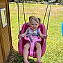Maelynn joined the competition — help win amazing prizes! toddler, child, swing, playground, outdoor, grass, smiling, happy, rope, pink_swing, sunlight, pigtails, wooden_playhouse, barefoot, summer, play, fun, daylight, seat, nature