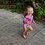 child, girl, smile, outdoor, concrete, plants, greenery, footwear, sandals, swimsuit, happy, cute, playful, sunny, nature, walking, joy, summer, portrait, casual
