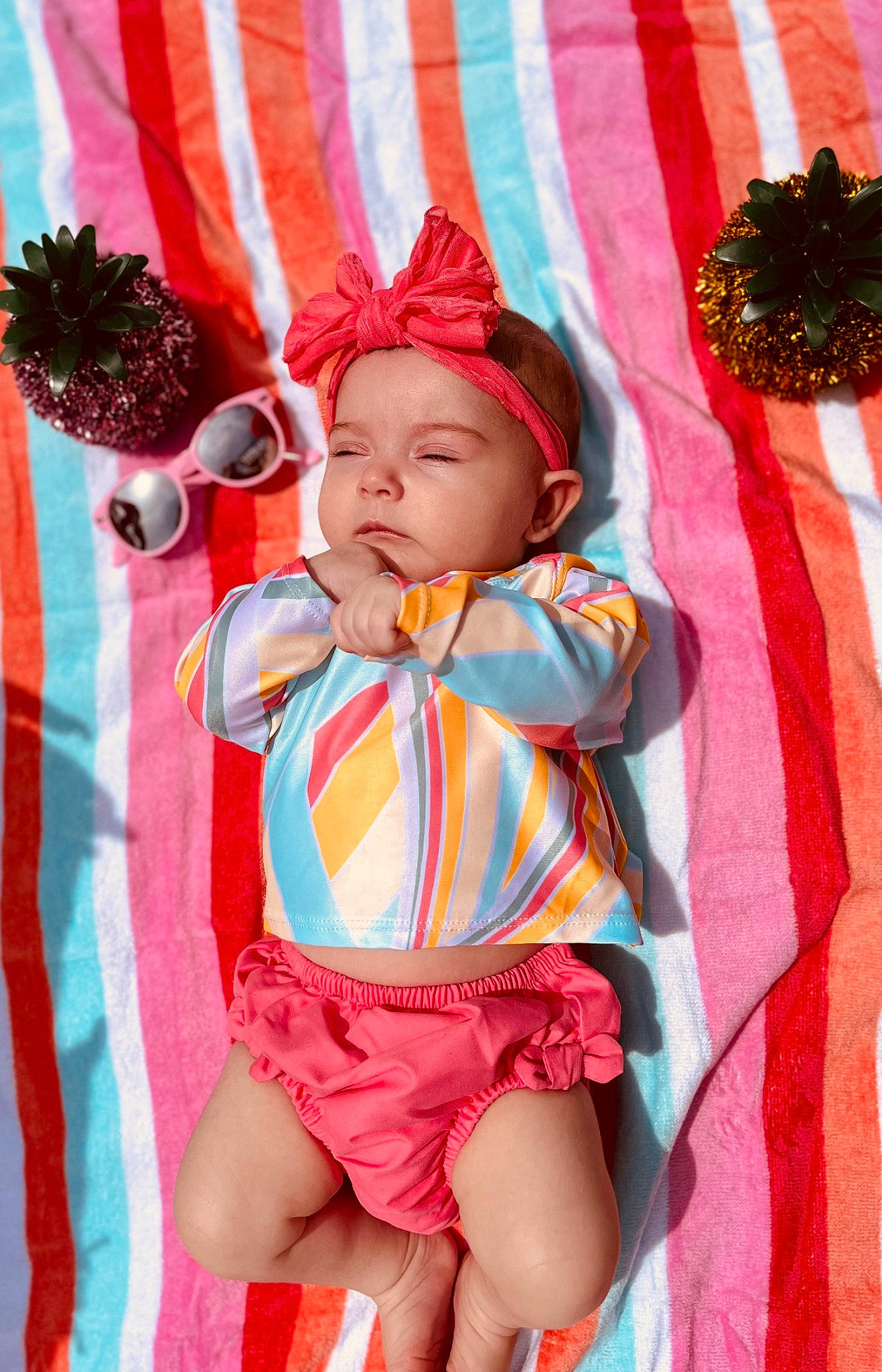 Novalynn joined the competition — help win amazing prizes! baby, baby_products, baby_toddler_clothing, cap, child, eye, fun, happy, headwear, linens, magenta, orange, pattern, peach, person, pink, red, sitting, skin, t_shirt