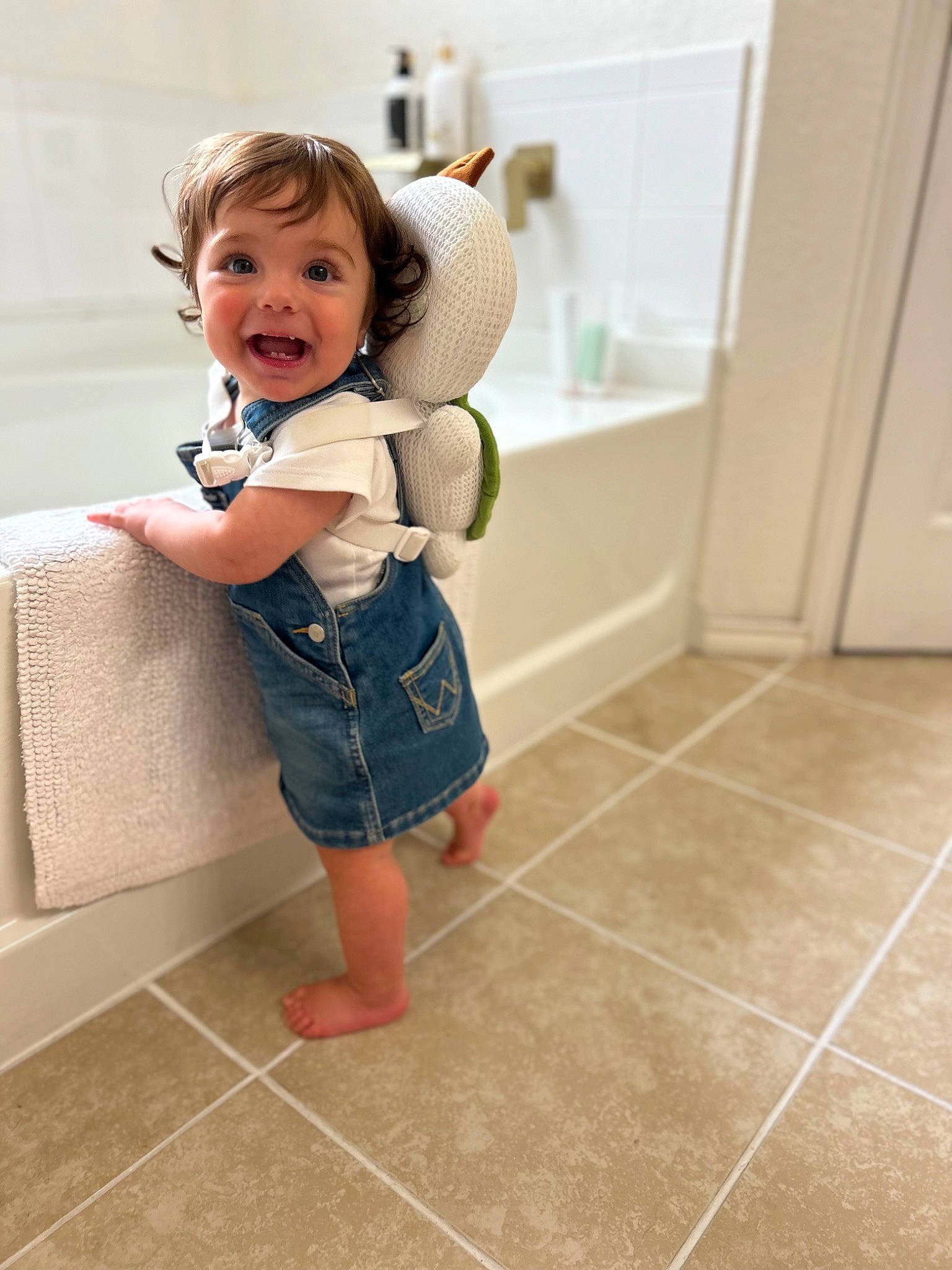 Eve joined the competition — help win amazing prizes! baby, baby_toddler_clothing, barefoot, door, floor, flooring, foot, happy, hardwood, human_leg, joy, knee, pattern, person, room, sleeve, smile, thigh, tile_flooring, toddler