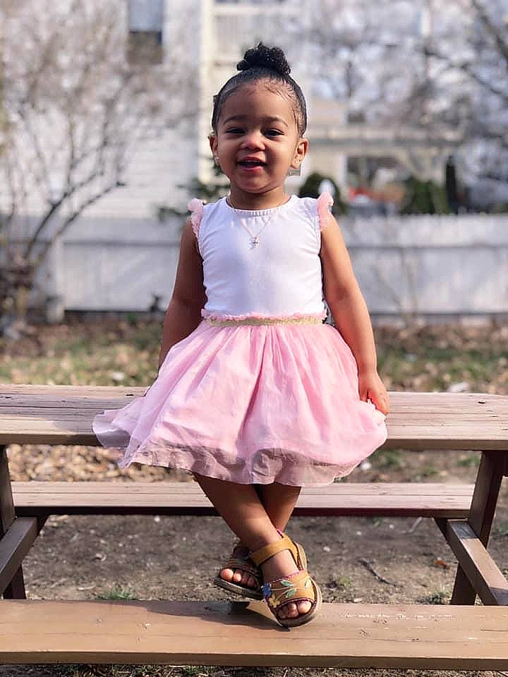 Angelyn is registered to the contest to win money with this photo: baby_toddler_clothing, child, child_model, clothing, dress, joy, pattern, person, photograph, photography, pink, shoe, smile, snapshot, toddler