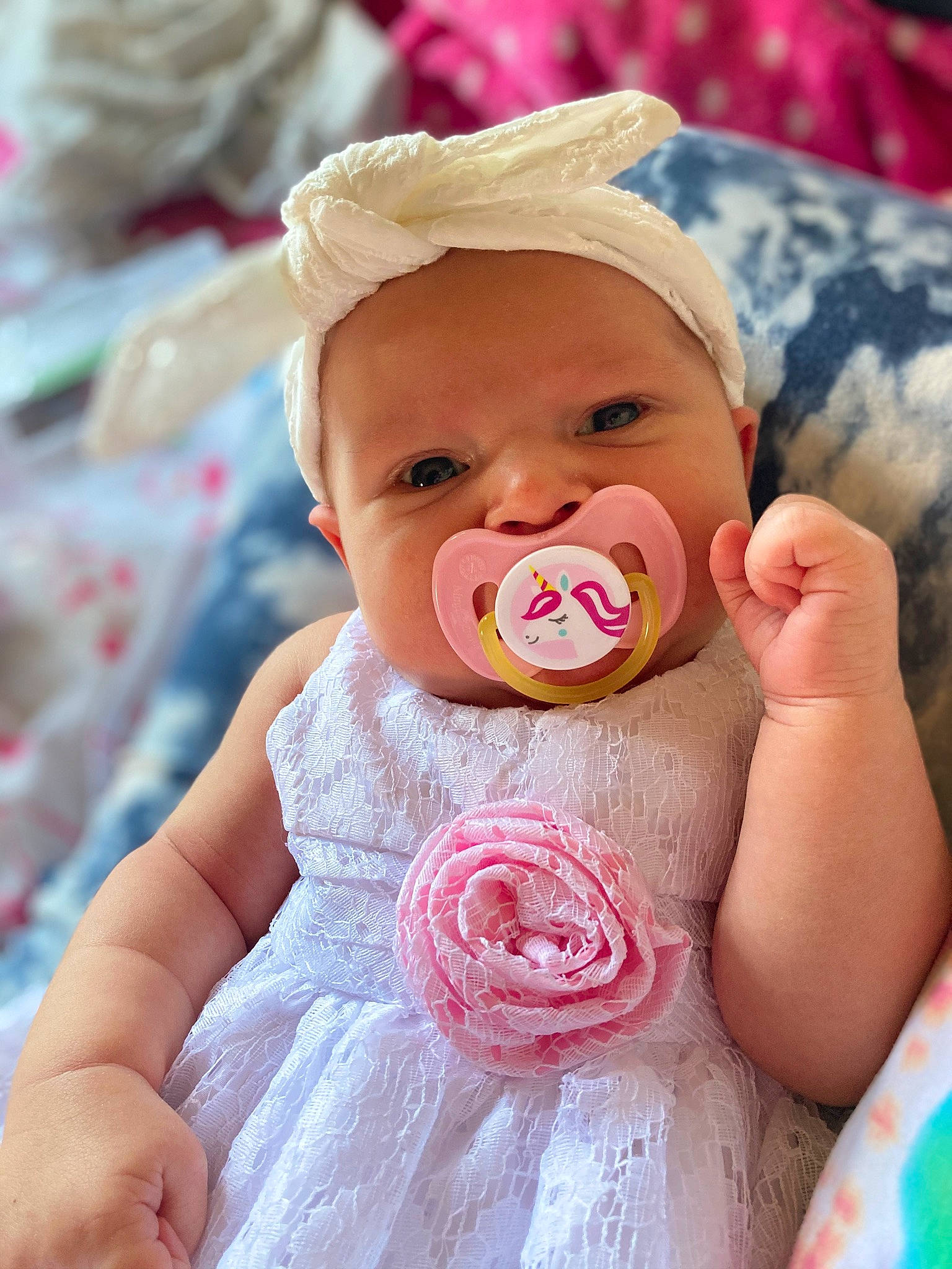 Maggie joined the competition — help win amazing prizes! baby, baby_products, baby_toddler_clothing, cheek, comfort, dress, finger, gesture, hand, happy, hat, head, lip, nail, nose, person, pink, skin, textile, thumb